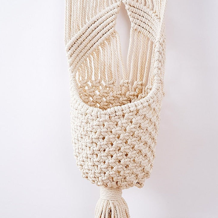 Filet de rangement en fil de coton et perles en bois façon macramé